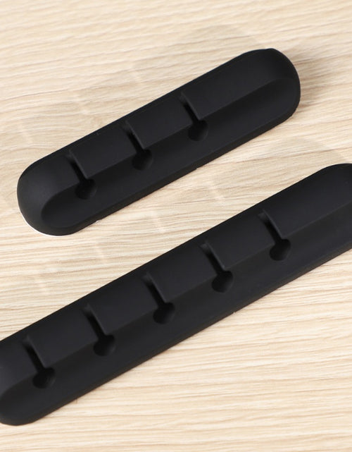 Load image into Gallery viewer, Silicone USB Cable Winder Desktop Cable Organizer Management Multipurpose Clips Cables Protector For Wired Headphones
